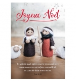 CARTE Fin d'année Figurine de crèche sur une table