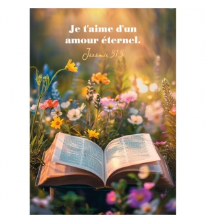 Carte Avec Verset Bible posée dans un champ de fleurs