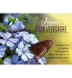 Carte "Joyeux Anniversaire" papillon posé sur des fleurs bleues